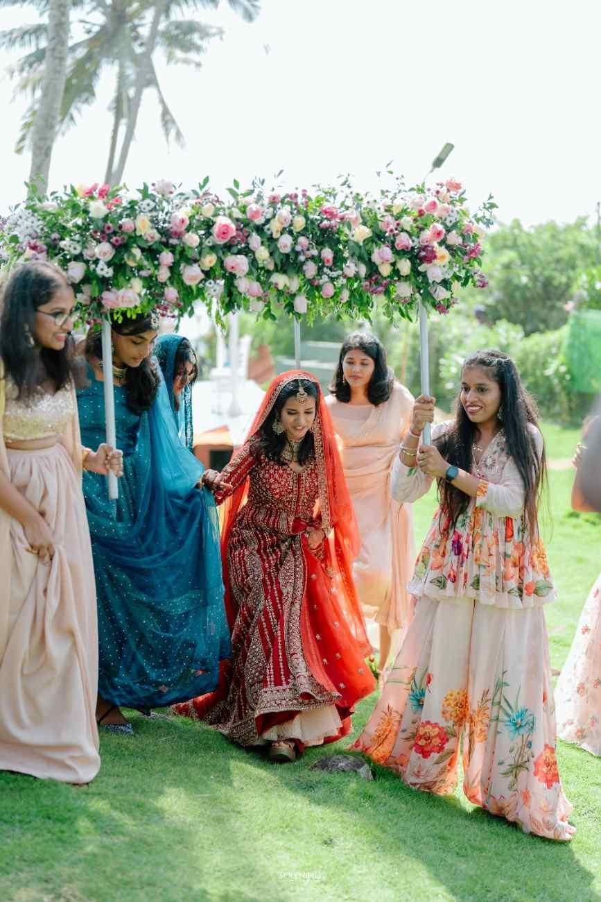 Bride sharing a candid moment with her bridesmaid