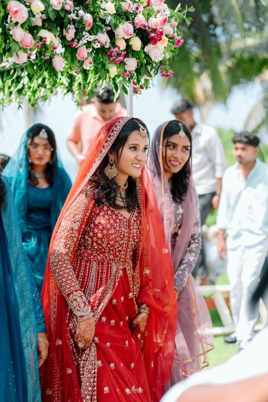 Muslim bride entering her destination wedding ceremony