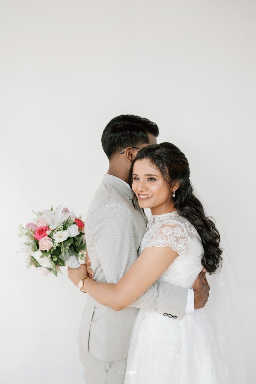 Christian couple embracing at their destination wedding
