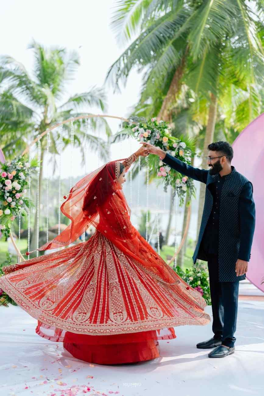 Muslim couple twirling during a destination wedding portrait session